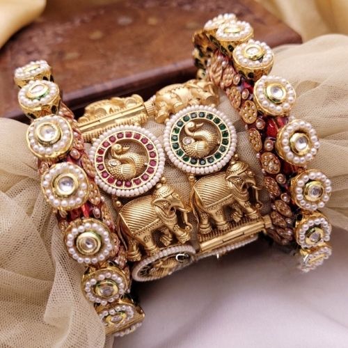 Royal Elephant Motif Gold Chuda Bangles with Green & Red Accents