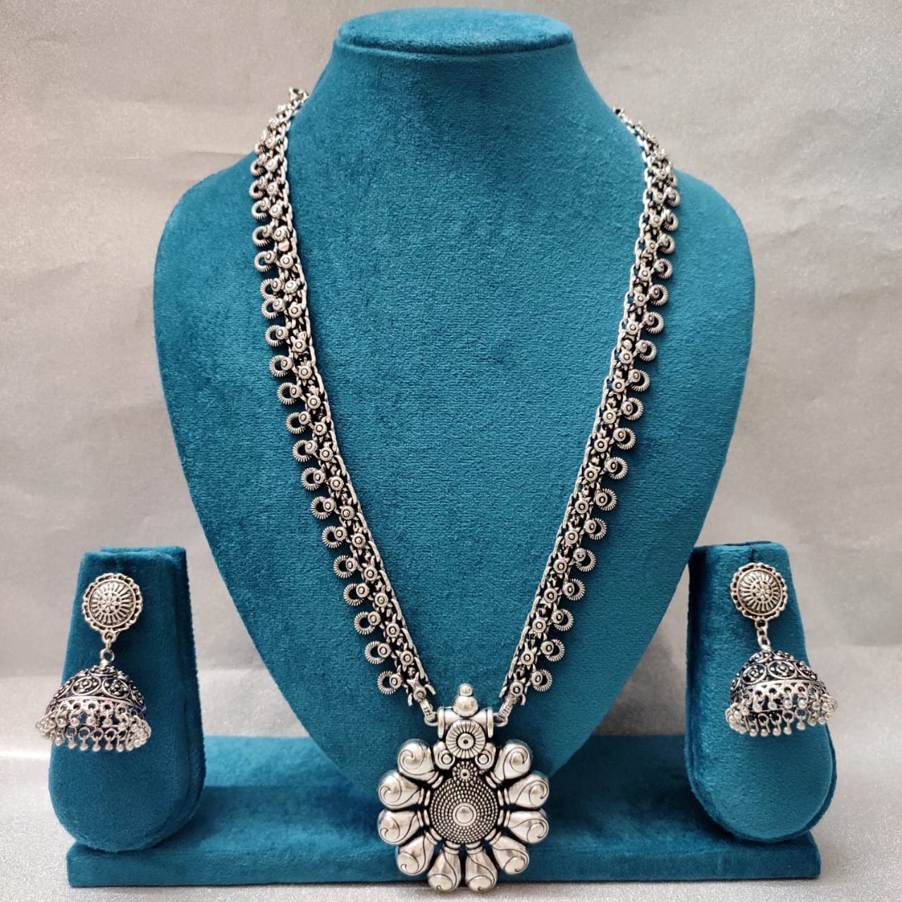 Lotus Bloom Oxidised Necklace Set with Carved Dome Jhumkas