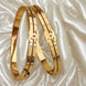 Glossy Golden Twin Strap Bracelet – Elegant Modern Design for Women