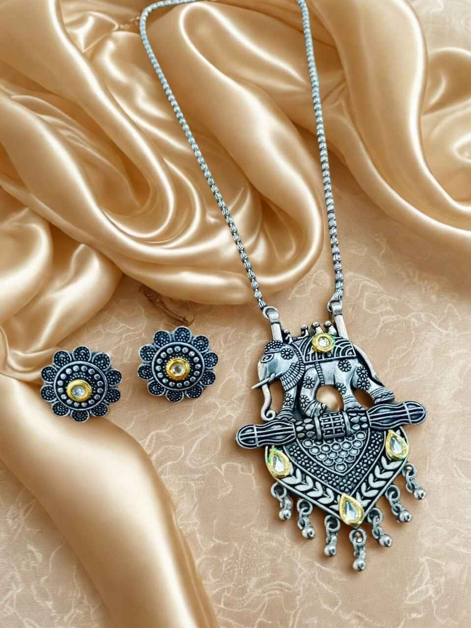 Oxidised Elephant Motif Kundan Pendant Set with Floral Earrings