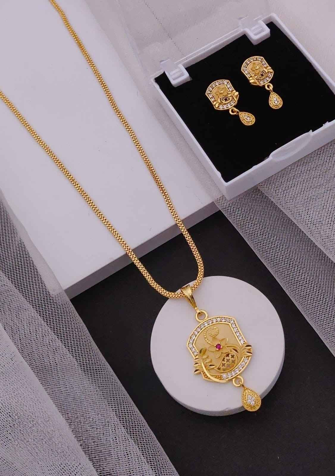 Elegant Peacock Gold Pendant Necklace and Earrings Set with Ruby Accent